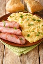 Pease PuddingÃÂ is an easy, British side dish traditionally serve with ham closeup in the plate. Vertical Royalty Free Stock Photo